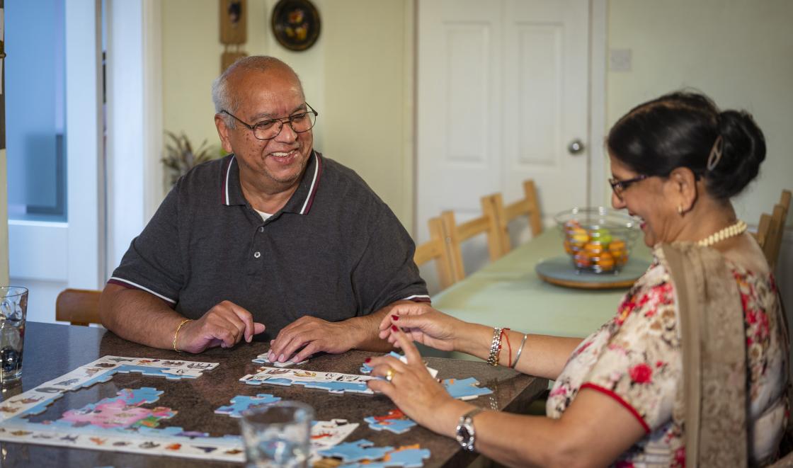 Asian couple doing a puzzle  - photo from the Centre for Ageing Better