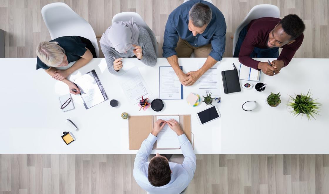 An interview panel interviewing a candidate
